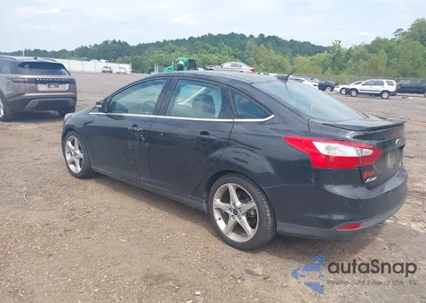 2014 Ford Focus Titanium from USA, damaged, VIN 1FADP3J22EL460562